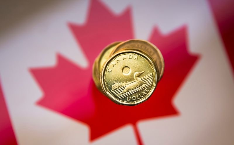 Dólar canadiense cae por tensiones comerciales y perspectiva de la Fed